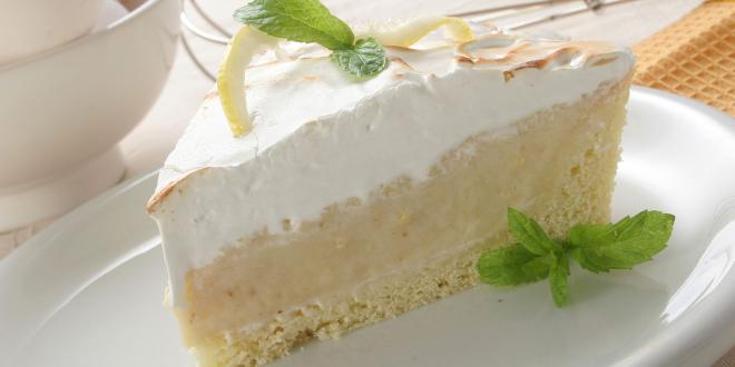 A slice of creamy lemon pie with gluten-free crust